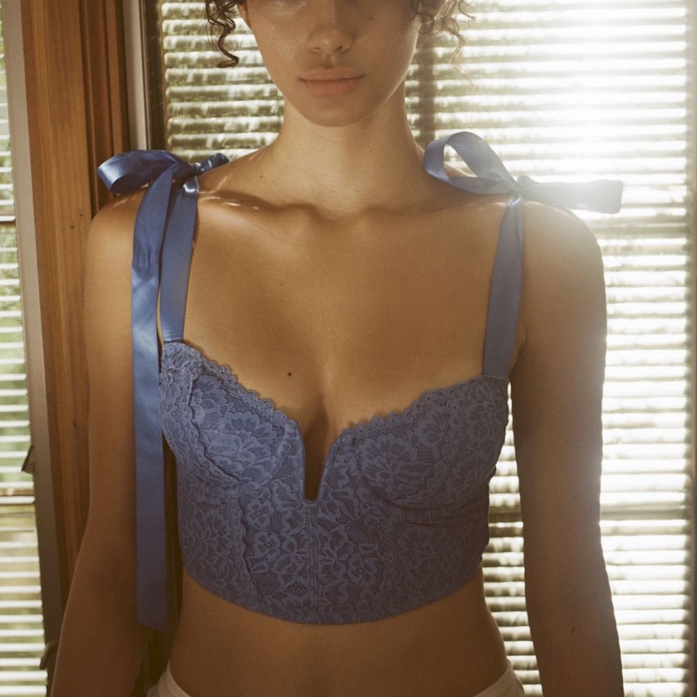 urban outfitters, lace bow bustier, marked M, would recommend for smaller chest